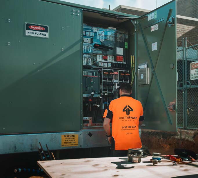 Electrician fixing the breaker